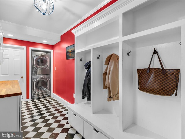 13295 Rollie Road E Rd, Bishopville, MD 21813 - mudroom featuring estacked washer and dryer, tile patterned floors, ornamental molding, and recessed lighting