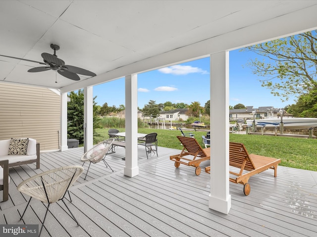 13295 Rollie Road E Rd, Bishopville, MD 21813 - wooden terrace with ceiling fan and a yard