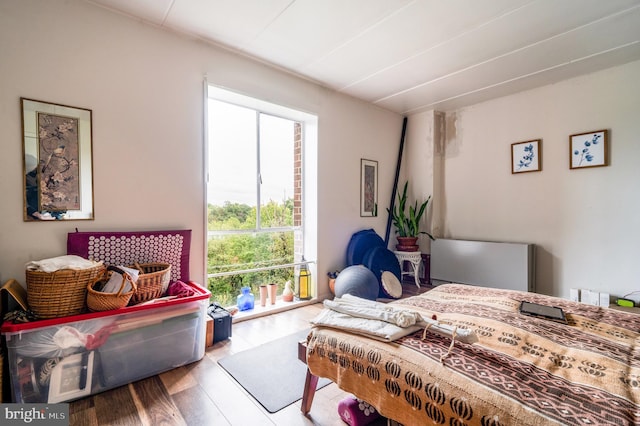 bedroom with wood finished floors