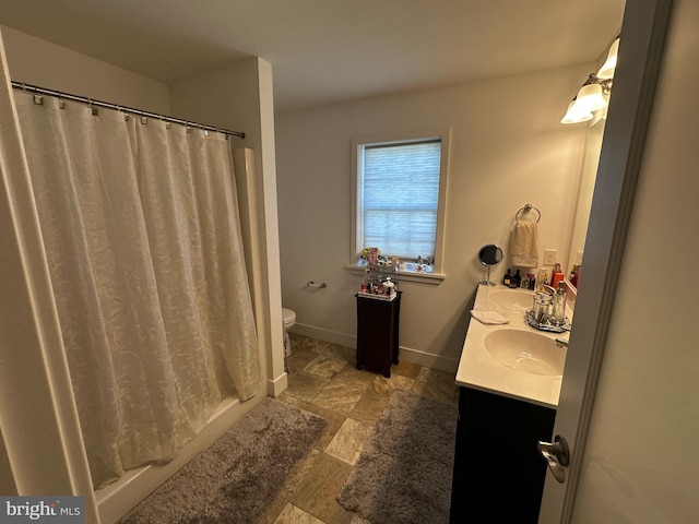 13 Verbena Dr, Lancaster, PA 17602 - bathroom with a sink, a shower with curtain, toilet, and double vanity