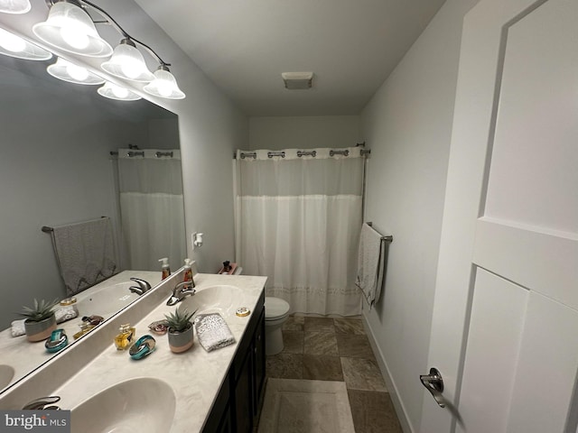 13 Verbena Dr, Lancaster, PA 17602 - bathroom with a sink, curtained shower, toilet, and double vanity