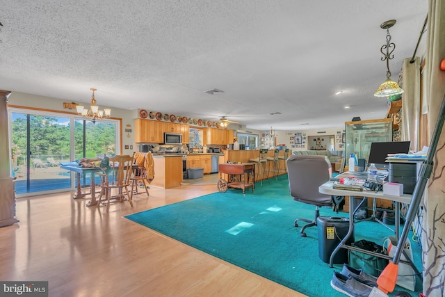 429 Thomas Ave, Little Egg Harbor Twp, NJ 08087 - home office featuring light wood finished floors, a textured ceiling, ceiling fan with notable chandelier, and visible vents