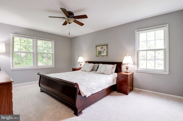 9504 Broome Ct, Vienna, VA 22182 - bedroom featuring light carpet, baseboards, and a ceiling fan