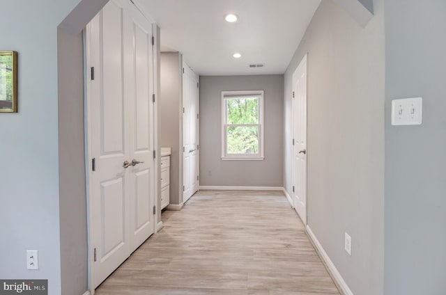 9504 Broome Ct, Vienna, VA 22182 - hallway with light wood-type flooring, recessed lighting, and baseboards