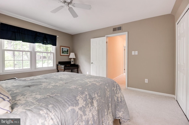 9504 Broome Ct, Vienna, VA 22182 - bedroom with light colored carpet, a closet, baseboards, and a ceiling fan