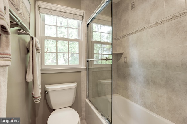 9504 Broome Ct, Vienna, VA 22182 - bathroom with shower / bath combination with glass door and toilet