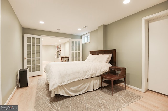 9504 Broome Ct, Vienna, VA 22182 - bedroom featuring wood finished floors, french doors, recessed lighting, and baseboards