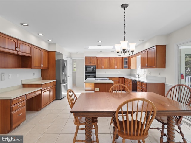 dining room with light tile patterned floors, a chandelier, a healthy amount of sunlight, and recessed lighting