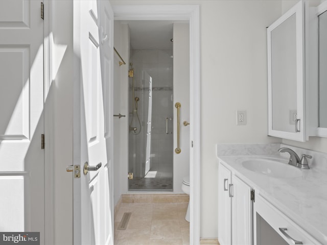full bath with visible vents, tile patterned flooring, vanity, toilet, and a stall shower