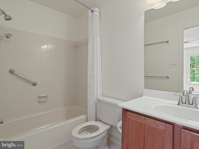full bathroom with vanity, toilet, and shower / tub combo