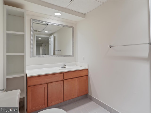bathroom with visible vents, tile patterned flooring, vanity, baseboards, and recessed lighting