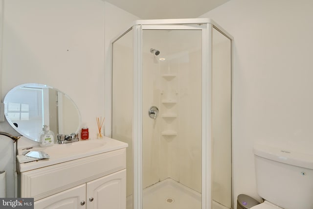 524 S Luzerne Ave, Baltimore, MD 21224 - full bath featuring vanity, a shower stall, and toilet
