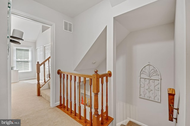7228 Lensfield Ct, Alexandria, VA 22315 - corridor featuring an upstairs landing, carpet, and vaulted ceiling