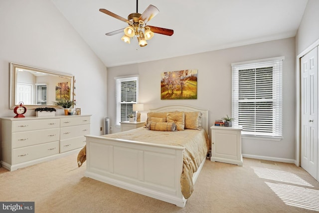 7228 Lensfield Ct, Alexandria, VA 22315 - bedroom featuring light carpet, lofted ceiling, a closet, and ceiling fan