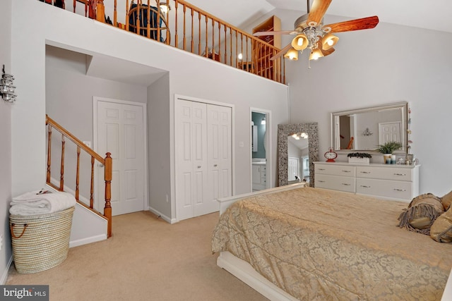 7228 Lensfield Ct, Alexandria, VA 22315 - carpeted bedroom with high vaulted ceiling, a closet, connected bathroom, and ceiling fan