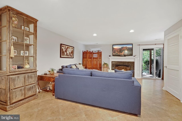 7228 Lensfield Ct, Alexandria, VA 22315 - living room featuring a fireplace, recessed lighting, and light tile patterned floors