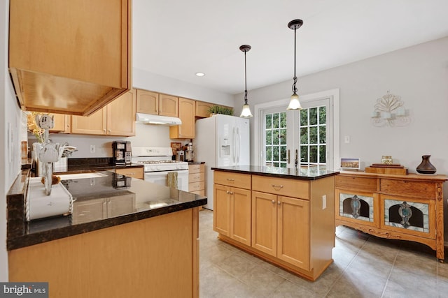 7228 Lensfield Ct, Alexandria, VA 22315 - kitchen with white appliances, under cabinet range hood, light brown cabinetry, dark stone countertops, and hanging light fixtures