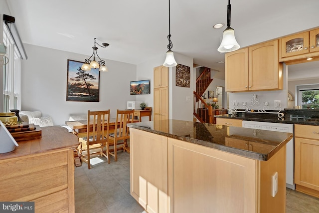 7228 Lensfield Ct, Alexandria, VA 22315 - kitchen featuring light brown cabinets, a center island, light tile patterned floors, and hanging light fixtures