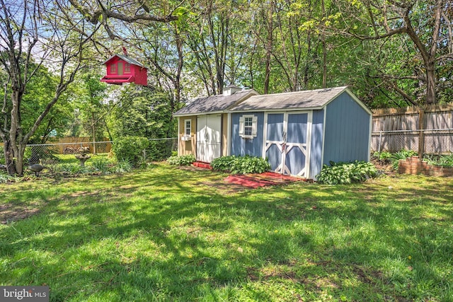 321 E E St, Purcellville, VA 20132 - view of shed featuring a fenced backyard