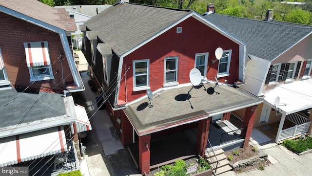 817 Ridge St, Easton, PA 18042 - view of front facade with brick siding and roof with shingles