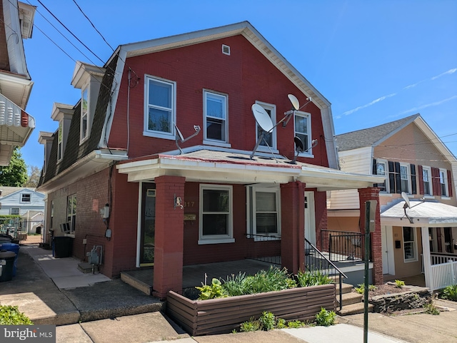 817 Ridge St, Easton, PA 18042 - view of front of home featuring covered porch and brick siding