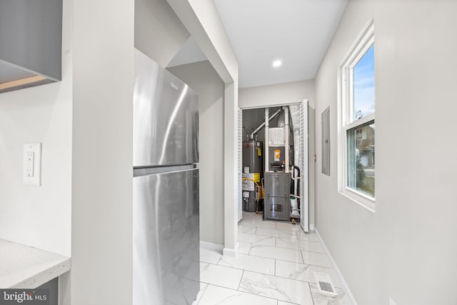 6 Plymouth Ter, Egg Harbor Township, NJ 08234 - hall with water heater, marble finish floor, baseboards, heating unit, and electric panel