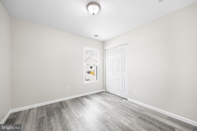 6 Plymouth Ter, Egg Harbor Township, NJ 08234 - unfurnished room featuring baseboards, visible vents, and wood finished floors