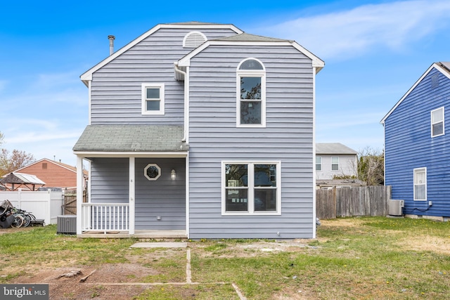 6 Plymouth Ter, Egg Harbor Township, NJ 08234 - rear view of house featuring fence, a yard, and central AC
