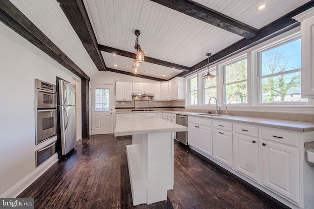 1211 Crestover Rd, Wilmington, DE 19803 - kitchen with dark wood finished floors, a sink, lofted ceiling with beams, a warming drawer, and stainless steel appliances