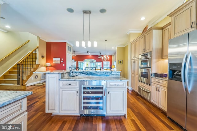kitchen featuring a warming drawer, dark wood finished floors, appliances with stainless steel finishes, and beverage cooler