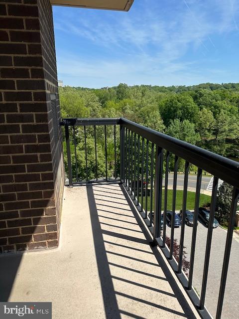 balcony with a forest view