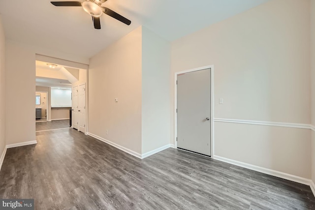 2024 E Baltimore St E, Baltimore, MD 21231 - unfurnished room featuring ceiling fan, wood finished floors, and baseboards