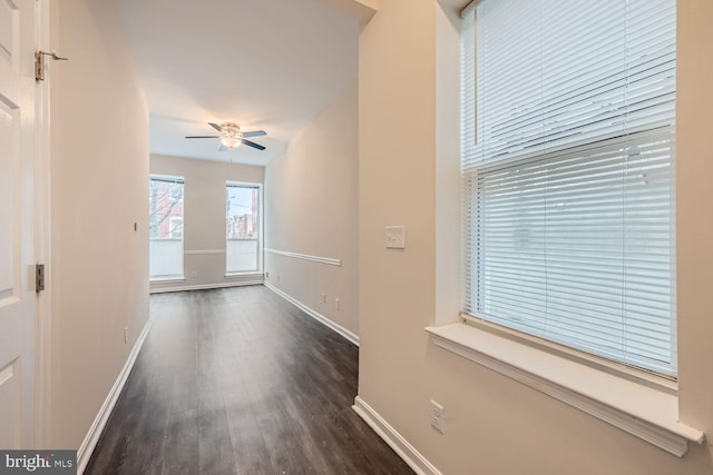 2024 E Baltimore St E, Baltimore, MD 21231 - hallway featuring baseboards and dark wood-type flooring