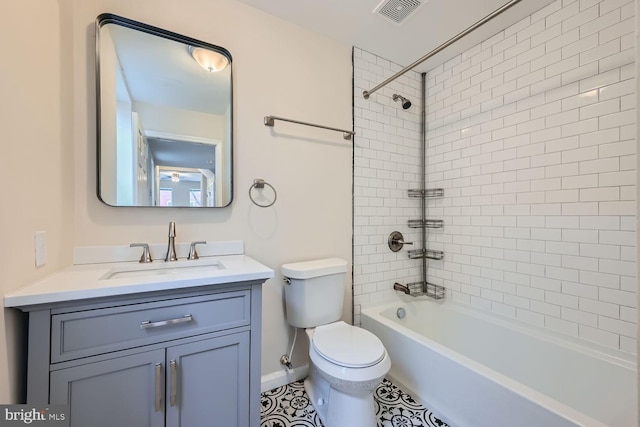 2024 E Baltimore St E, Baltimore, MD 21231 - bathroom with toilet, vanity, tub / shower combination, baseboards, and tile patterned flooring