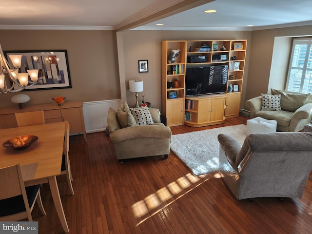 living area with crown molding, dark wood finished floors, baseboards, and a notable chandelier