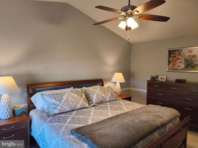 bedroom with baseboards, a ceiling fan, and lofted ceiling