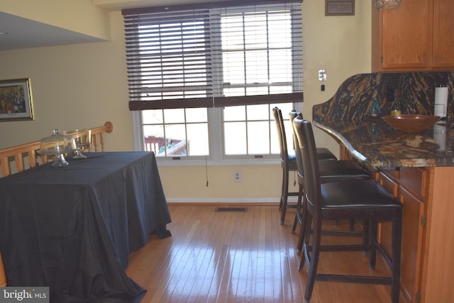 1716 Pebble Beach Dr, Bowie, MD 20721 - bedroom with wood-type flooring, baseboards, and visible vents