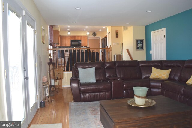 1716 Pebble Beach Dr, Bowie, MD 20721 - living room featuring recessed lighting, visible vents, and light wood-style flooring