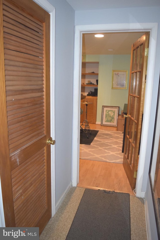 1716 Pebble Beach Dr, Bowie, MD 20721 - corridor featuring recessed lighting, baseboards, and wood finished floors