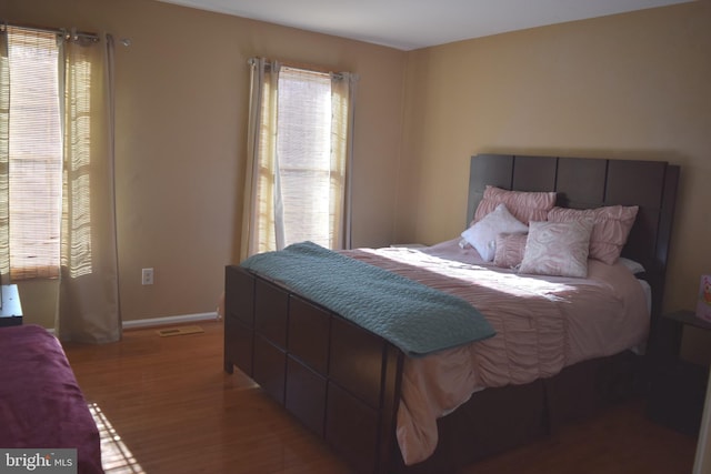 1716 Pebble Beach Dr, Bowie, MD 20721 - bedroom with baseboards and light wood-type flooring