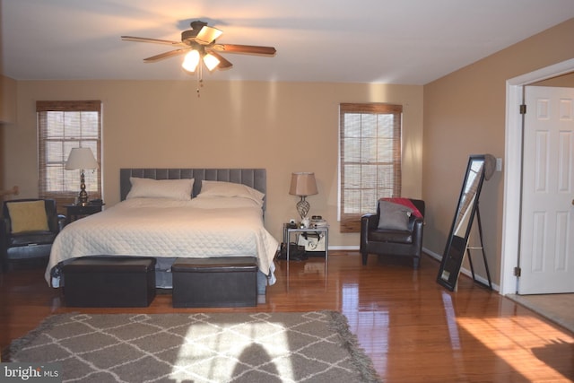 1716 Pebble Beach Dr, Bowie, MD 20721 - bedroom with baseboards, multiple windows, and wood finished floors
