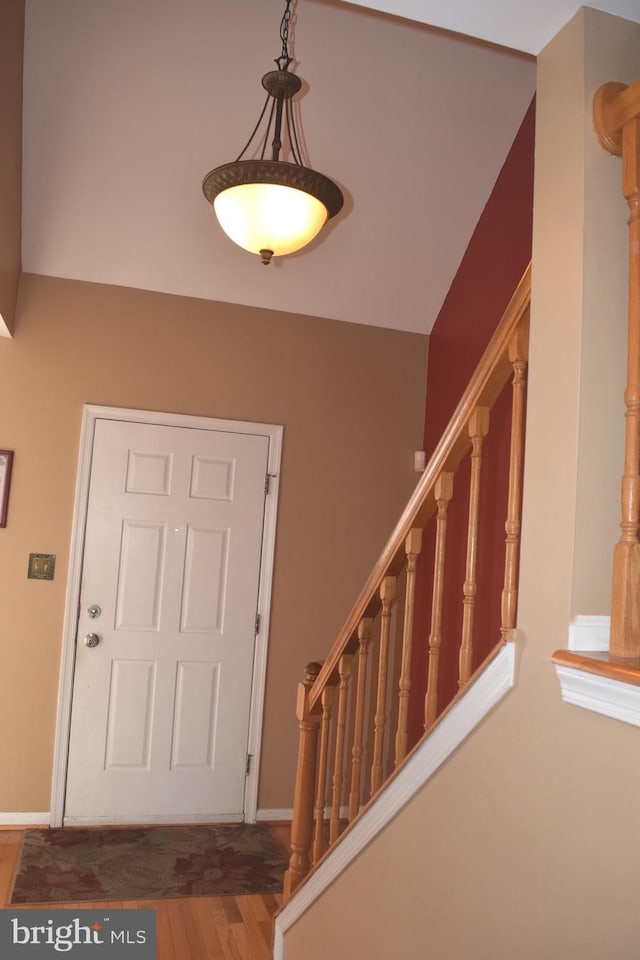 1716 Pebble Beach Dr, Bowie, MD 20721 - foyer entrance with stairway, baseboards, and wood finished floors