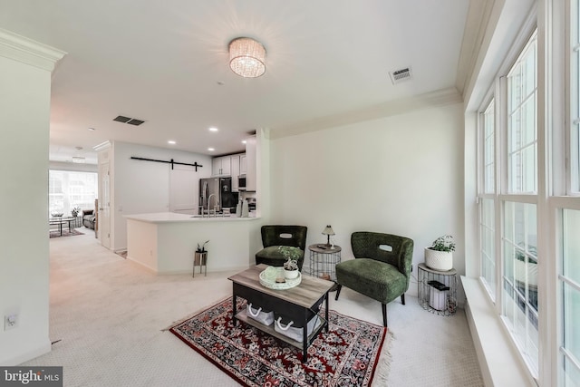5922 Terrapin Pl Unit 5922, Alexandria, VA 22310 - living room with a barn door, ornamental molding, light carpet, and recessed lighting