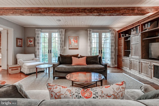 living room with wooden ceiling, french doors, beam ceiling, and wood finished floors