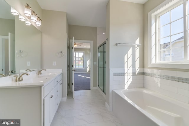 7826 Sugar Maple Dr, Milford, DE 19963 - bathroom with a ceiling fan, a shower stall, marble finish floor, and a garden tub
