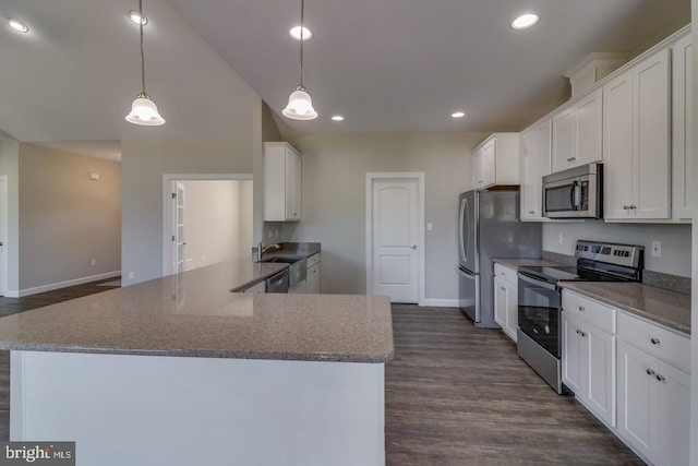 7826 Sugar Maple Dr, Milford, DE 19963 - kitchen with baseboards, dark wood finished floors, appliances with stainless steel finishes, and white cabinets
