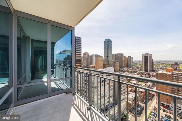 balcony featuring a view of city