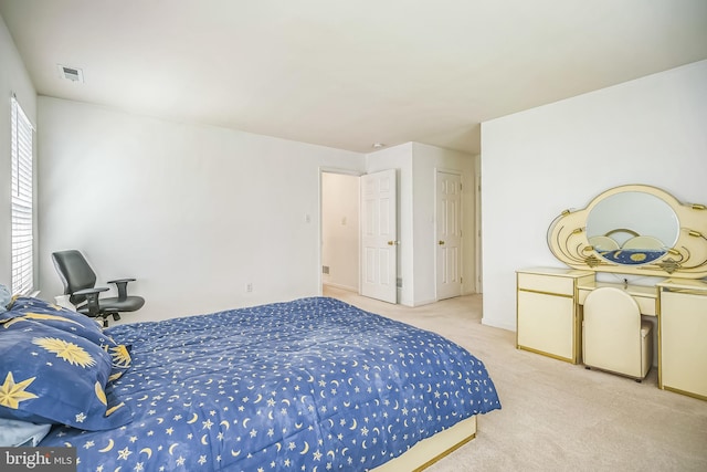 bedroom featuring carpet and visible vents