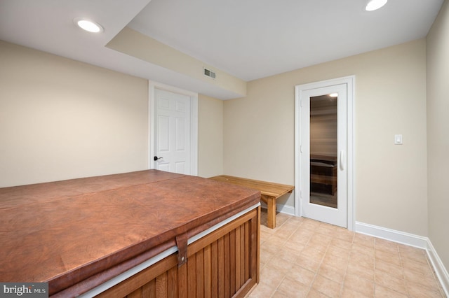 unfurnished office with recessed lighting, baseboards, and visible vents