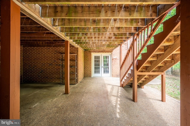 view of patio with french doors and stairway